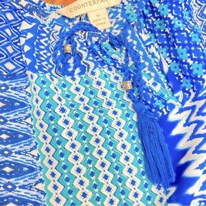 Counterparts Sz M pull over long sleeve blouse.